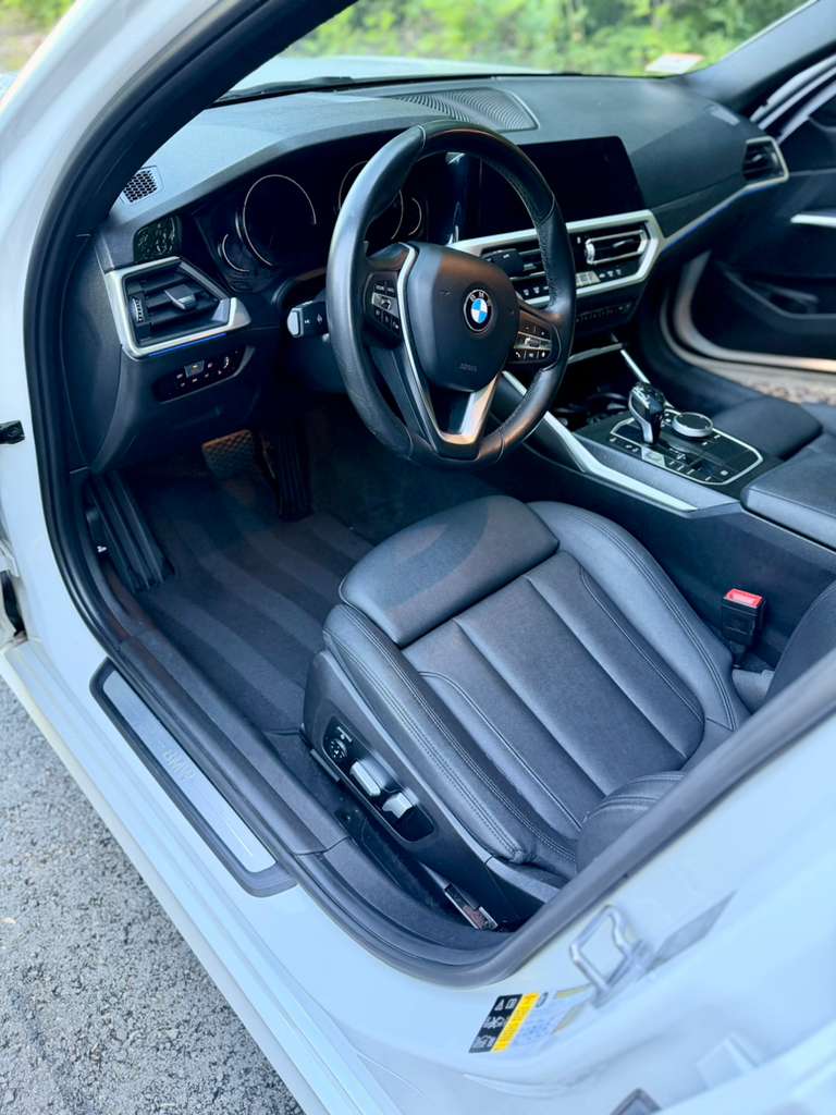 BMW interior after detailing — clean leather and dashboard