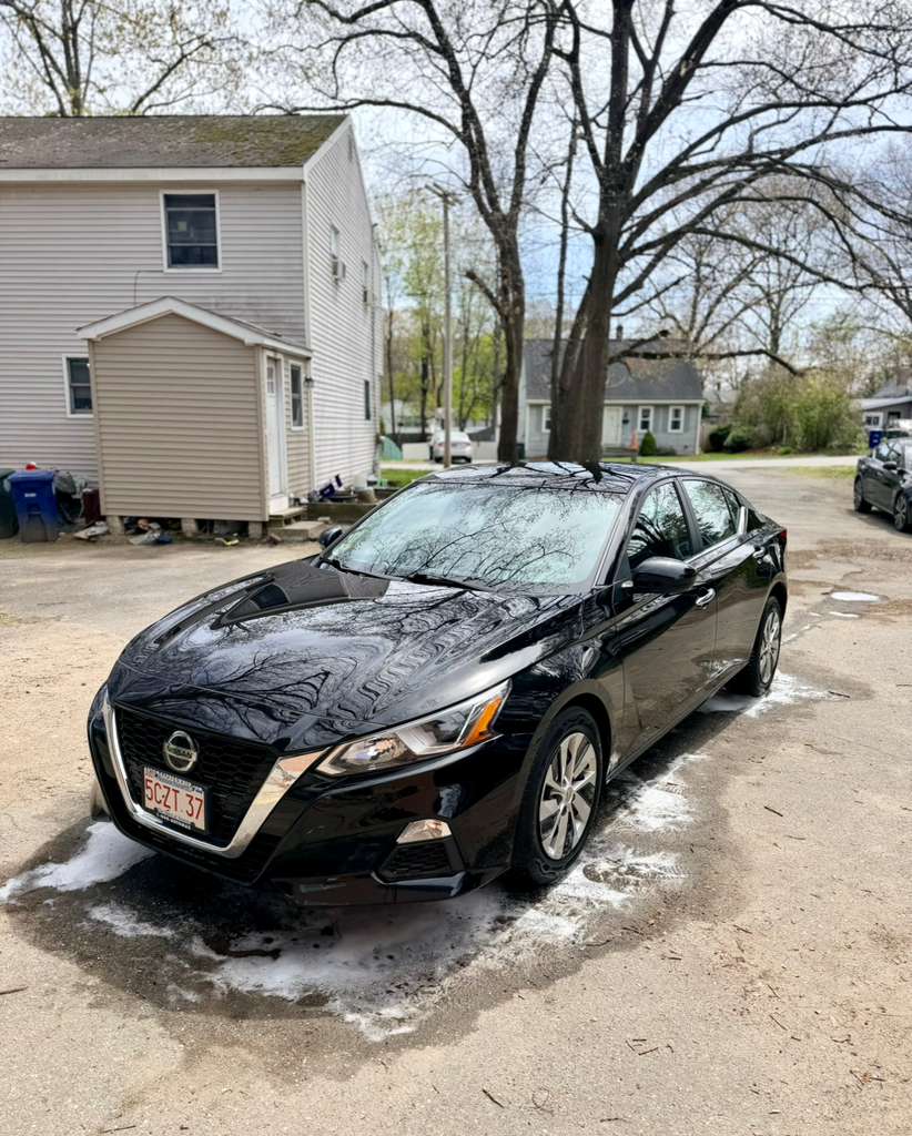 Nissan Altima exterior after detailing — mirror-like shine