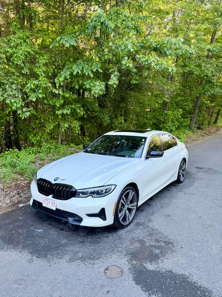 BMW 3 Series after detailing — deep gloss finish