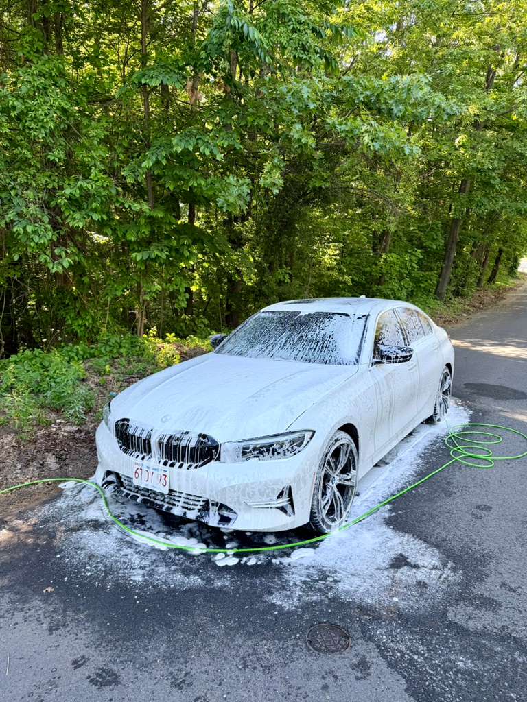BMW 3 Series covered in foam during the wash